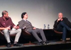 Renato Degiovani com Carlos Bighetti e Marcus Garrett, no palco do MIS, em outubro de 2022