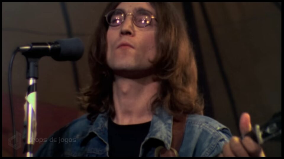 John Lennon e Yer Blues. Foto: Reprodução/YouTube/Montagem Pedro Zambarda/Drops de Jogos